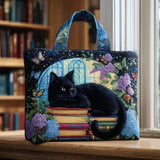 Bolso acolchado con estampado gato negro sobre libros