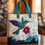 Bolso acolchado con estampado colibrí y flor blanca