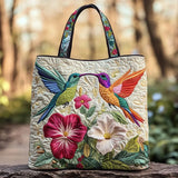 Bolso acolchado con estampado colibrí y flores blancas