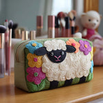 Cosmetiquera acolchada con estampado oveja
