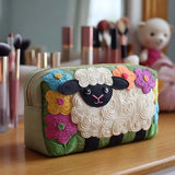 Cosmetiquera acolchada con estampado oveja con flores
