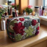 Cosmetiquera acolchada con estampado canto de jardín