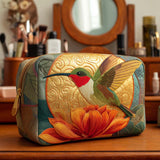 Cosmetiquera acolchada con estampado colibrí dorado