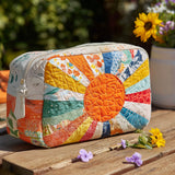 Cosmetiquera acolchada con estampado rayo dorado