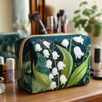 Cosmetiquera acolchada con estampado gracia de lirio