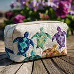 Cosmetiquera acolchada con estampado corriente marina