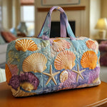 Bolso de viaje acolchado con estampado conchas en la playa
