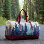 Bolso de viaje acolchado con estampado bosque de invierno