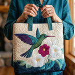Bolso acolchado con estampado colibrí y flor blanca